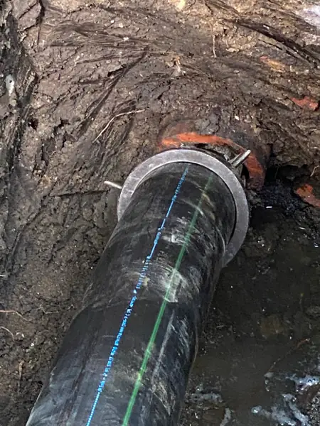 Pipe bursting head pulling new sewer pipe through an old clay sewer line in Granada Hills
